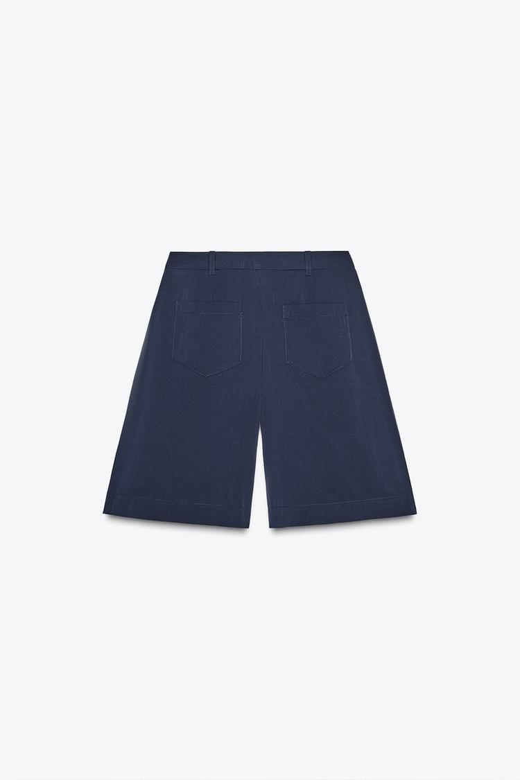 PLEATED LONG BERMUDA SHORTS