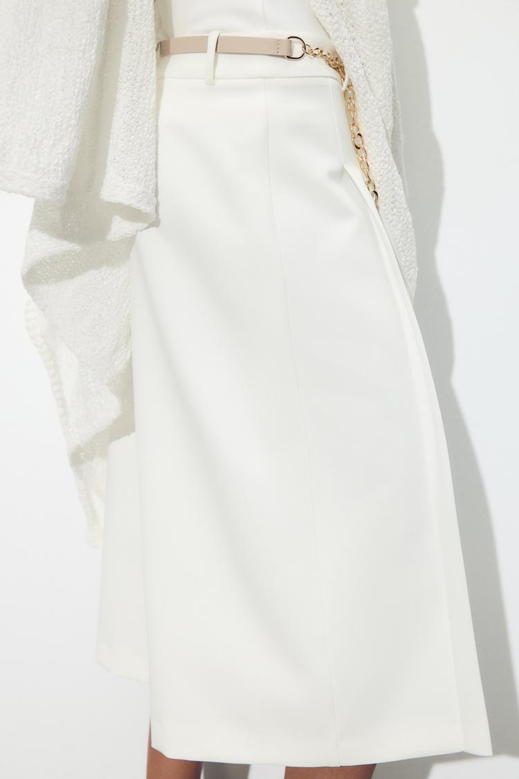 PLEATED BERMUDA SHORTS WITH BELT