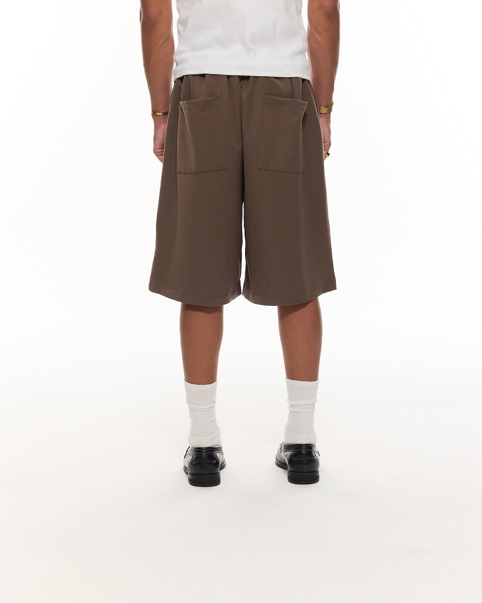 PLEATED SHORTS – BROWN