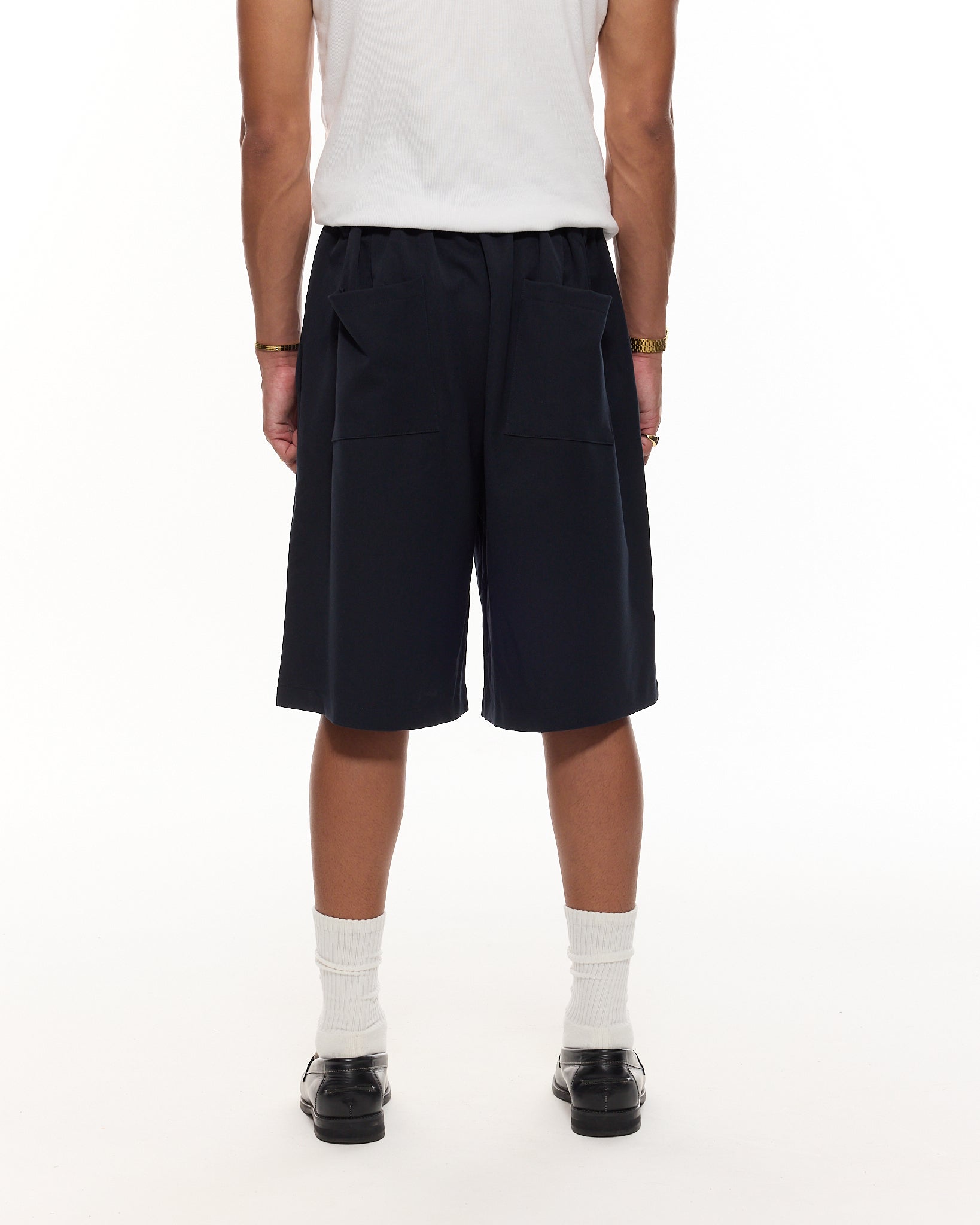 PLEATED SHORTS – NAVY BLUE